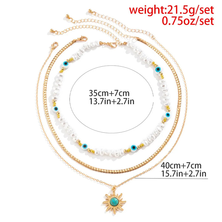 Set di Collane a Strati Parel & Occhio Maligno – Ciondolo Sole Boho